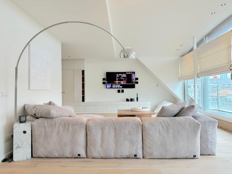 Living room of the apartment in Knokke, by the beach — Immo Pallen, Knokke-Le Zoute